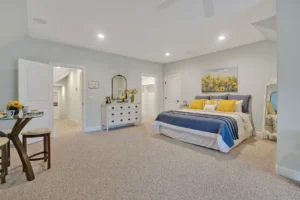 Bright blue and yellow bedroom with sunflower decor and cozy modern design.